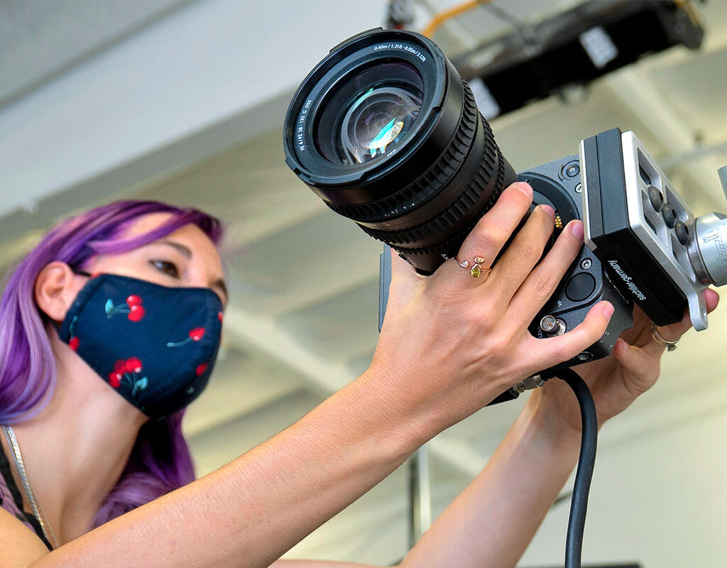 Employee doing electro-optics research