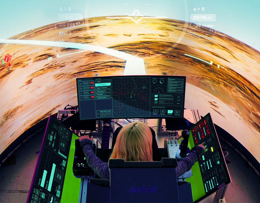 Employee testing a simulator prototype
